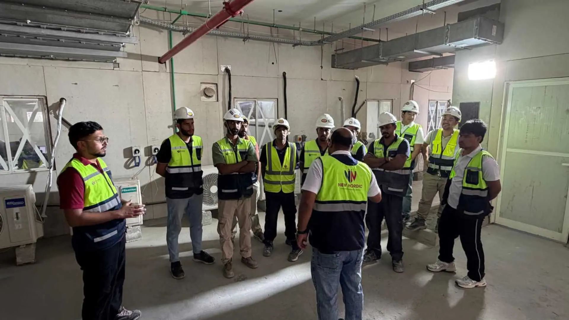 The New Nordic engineering team gathered for a site briefing in the UAE