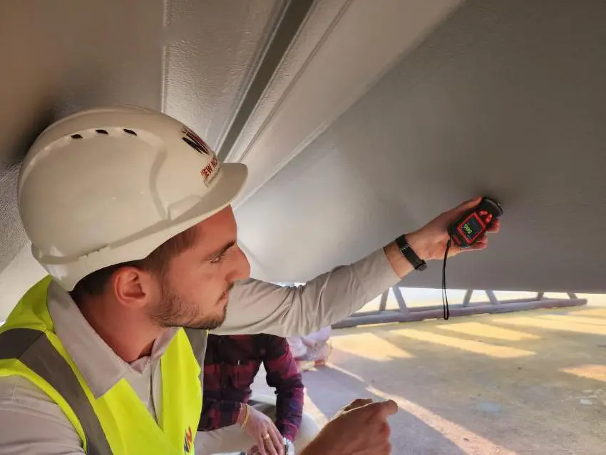 New Nordic engineer performing NDT testing beneath a bridge deck