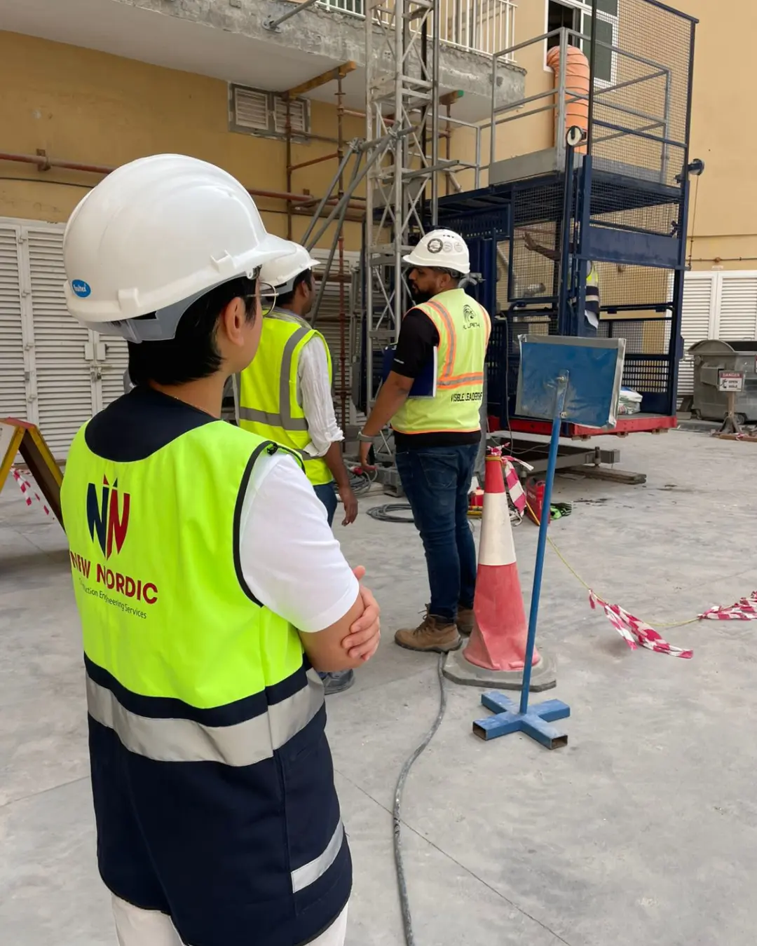 New Nordic engineers supervising structural strengthening works on scaffolding
