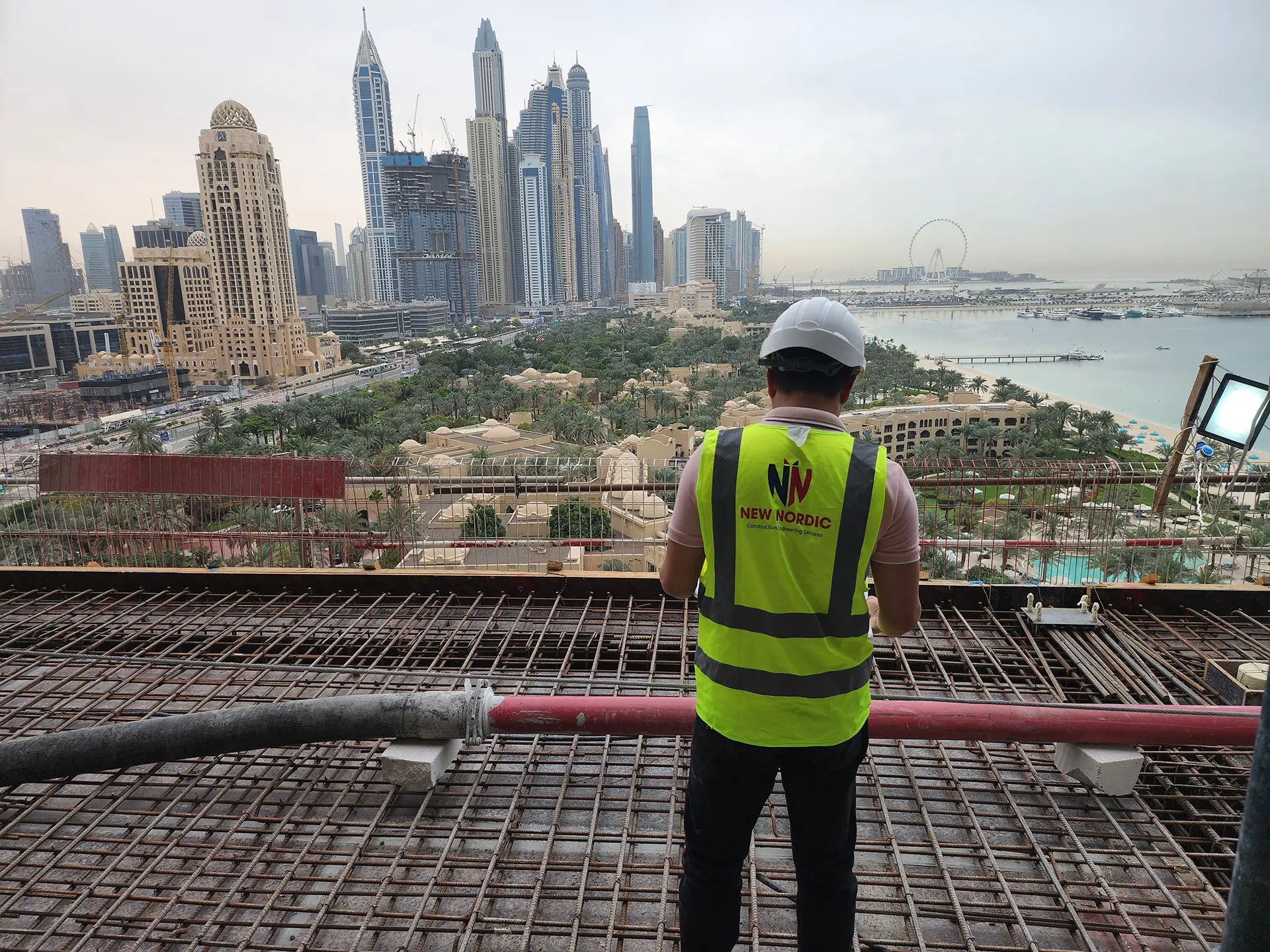 New Nordic engineer scanning a reinforced concrete deck above Dubai Marina